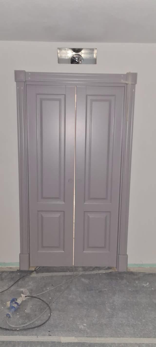 Porta blindata rivestita in noce